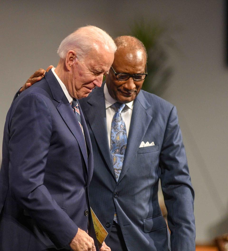 Pastor Jerry Young embraces former Vice President Joe Biden during church services at New Hope Baptist Church in Jackson, Miss. Sunday, March 8, 2020.