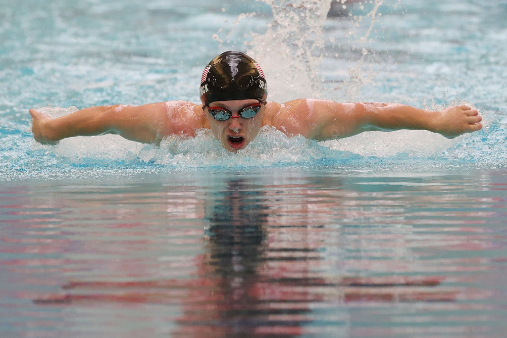 

<h3>Zachary Shattuck — Para swimming</h3><p>Zachary Shattuck is a 28-year-old swimmer from Mount Airy, Maryland, who first began swimming competitively at Frostburg State University.</p><p>Shattuck will be competing in his second Paralympic Games in Paris, and will be looking for his first medal.</p><p>Born with dwarfism and standing at 4-feet, 6-inches, he competes primarily in the S6 class, which includes those of short stature and those with certain coordination issues or the absence of limbs.</p><p>Along with his own training, Shattuck helps coach the St. Mary’s College swim team and also coaches a club team there, according to U.S. Paralympics Swimming.</p><p>He’s also an advocate for draft sports, having recently met with the U.S. ambassador to Argentina to raise awareness for dwarf sports, U.S. Paralympics Swimming reported.</p><p>” class=”gallery__photo-image”/><br>
                                    9/9</p><p>
                                MINNEAPOLIS, MINNESOTA — JUNE 19: Zachary Shattuck of the United States competes in the Men’s 200m Individual Medley during day 3 of the 2021 U.S. Paralympic Swimming Trials at the Jean K. Freeman Aquatic Center on June 19, 2021 in Minneapolis, Minnesota.<br>
(Photo by Stacy Revere/Getty Images)                            </p><p>                            Zachary Shattuck — Para swimming</p><p>Zachary Shattuck is a 28-year-old swimmer from Mount Airy, Maryland, who first began swimming competitively at Frostburg State University.</p><p>Shattuck will be competing in his second Paralympic Games in Paris, and will be looking for his first medal.</p><p>Born with dwarfism and standing at 4-feet, 6-inches, he competes primarily in the S6 class, which includes those of short stature and those with certain coordination issues or the absence of limbs.</p><p>Along with his own training, Shattuck helps coach the St. Mary’s College swim team and also coaches a club team there, according to U.S. Paralympics Swimming.</p><p>He’s also an advocate for draft sports, having recently met with the U.S. ambassador to Argentina to raise awareness for dwarf sports, U.S. Paralympics Swimming reported.</p><p class=