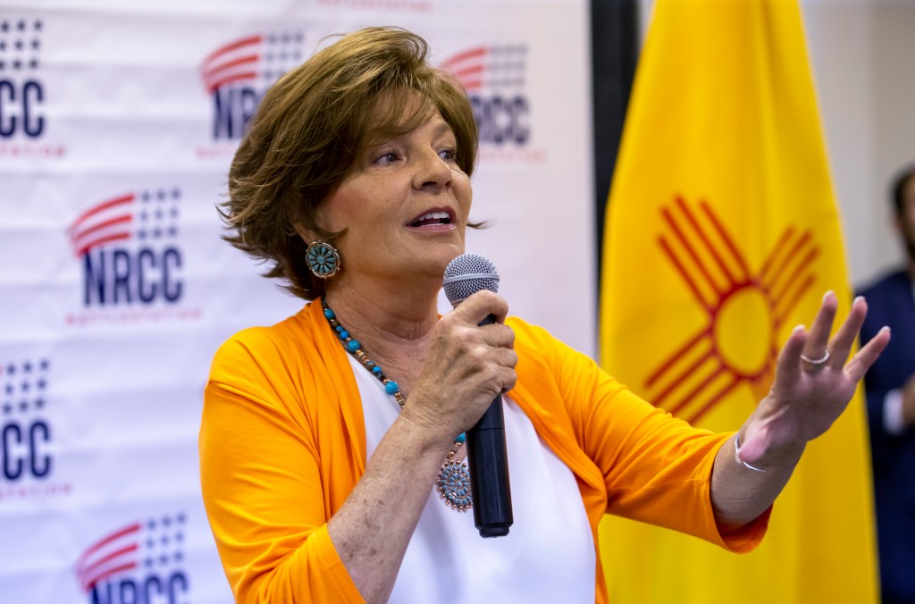 Republican U.S. House candidate Yvette Herrell speaking into a microphone at a campaign event in Las Cruces, New Mexico on August 21, 2024.