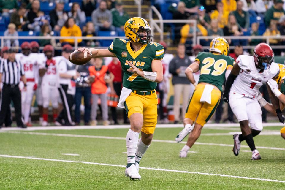 FARGO, NORTH DAKOTA - OCTOBER 29: Cam Miller #7 of the North Dakota State Bison attempts a pass against the Illinois State Redbirds at FARGODOME on October 29, 2022 in Fargo, North Dakota. (Photo by Sean Arbaut/Getty Images)