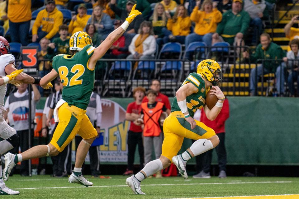 FARGO, NORTH DAKOTA - OCTOBER 29: Cole Payton #15 of the North Dakota State Bison runs the ball in for a touchdown against the Illinois State Redbirds in the second half at FARGODOME on October 29, 2022 in Fargo, North Dakota. (Photo by Sean Arbaut/Getty Images)