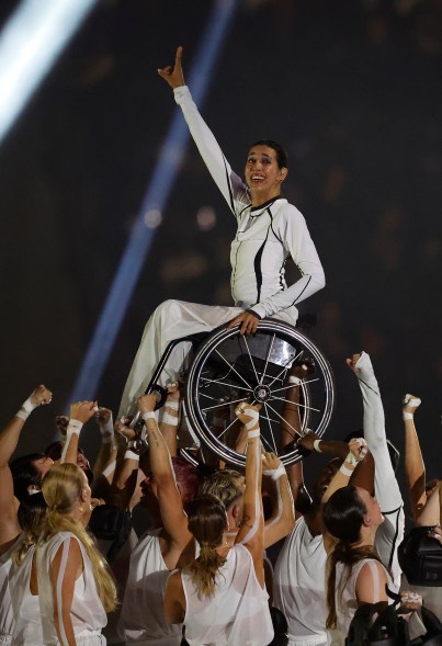 A performer is lifted during the opening ceremony of the Paris 2024 Summer Paralympic Games at Place de la Concorde on August 28, 2024 in Paris, France.