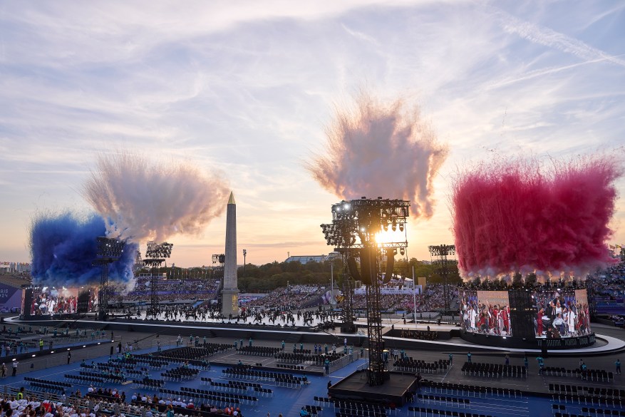 A general view as smoke is released in the colours of the French flag whilst dancers perform during the opening ceremony of the Paris 2024 Summer Paralympic Games at Stade de France on August 28, 2024 in Paris, France.