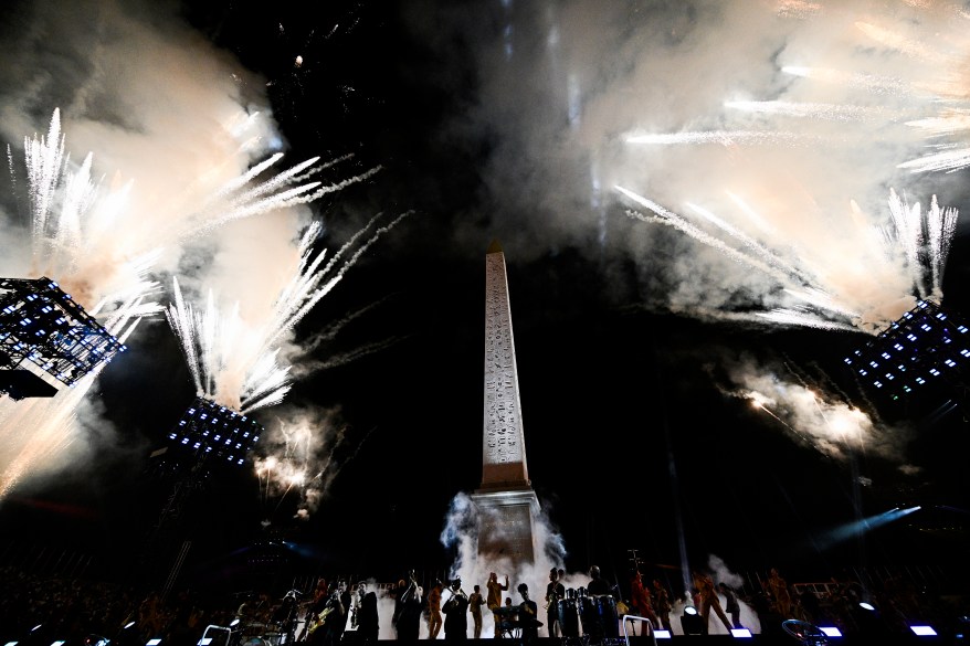 Artists perform with fireworks during the Paris 2024 Paralympic Games Opening Ceremony.