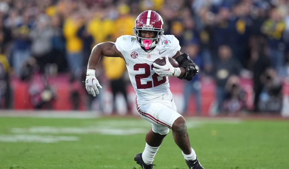 Jan 1, 2024; Pasadena, CA, USA; Alabama Crimson Tide running back Justice Haynes (22) runs the ball against the Michigan Wolverines during the second half in the 2024 Rose Bowl college football playoff semifinal game at Rose Bowl. Mandatory Credit: Kirby Lee-USA TODAY Sports