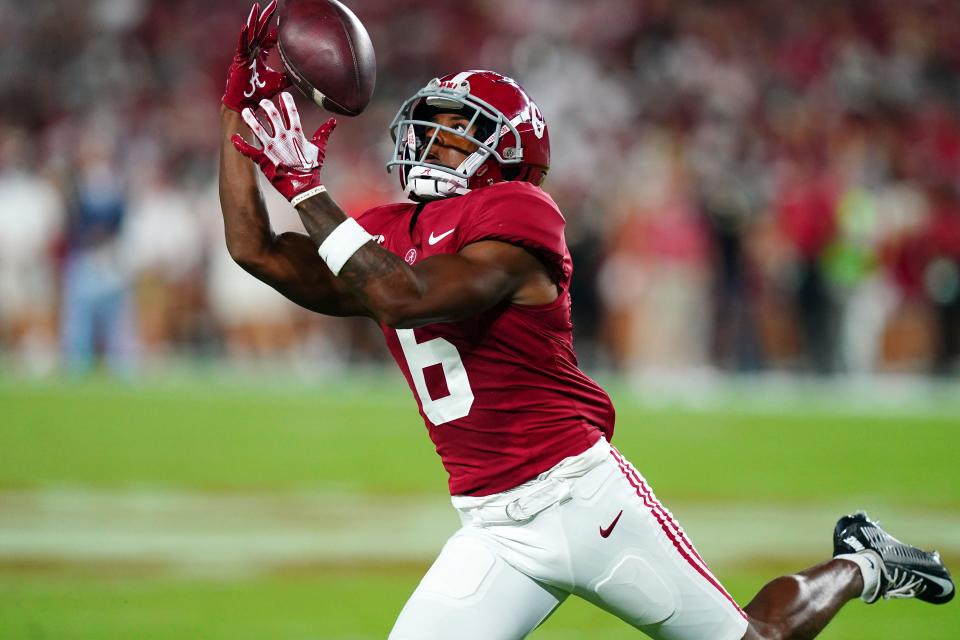 Sep 2, 2023; Tuscaloosa, Alabama, USA; Alabama Crimson Tide wide receiver Kobe Prentice (6) hangs on for a reception against the Middle Tennessee Blue Raiders during the second quarter at Bryant-Denny Stadium. Mandatory Credit: John David Mercer-USA TODAY Sports