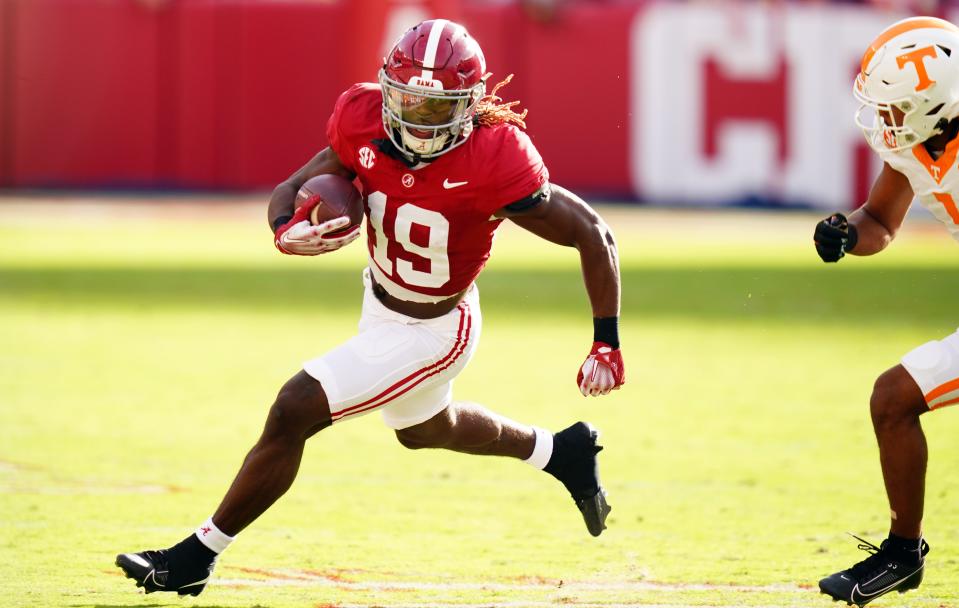 Oct 21, 2023; Tuscaloosa, Alabama, USA; Alabama Crimson Tide wide receiver Kendrick Law (19) carries up the field against the Tennessee Volunteers during the first half at Bryant-Denny Stadium. Mandatory Credit: John David Mercer-USA TODAY Sports