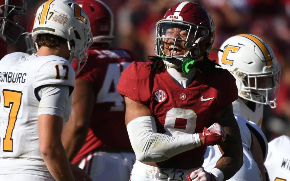 Nov 18, 2023; Tuscaloosa, Alabama, USA; Alabama Crimson Tide defensive back DeVonta Smith (8) celebrates after making a stop against the Chattanooga Mocs at Bryant-Denny Stadium. Alabama won 66-10. Mandatory Credit: Gary Cosby Jr.-USA TODAY Sports