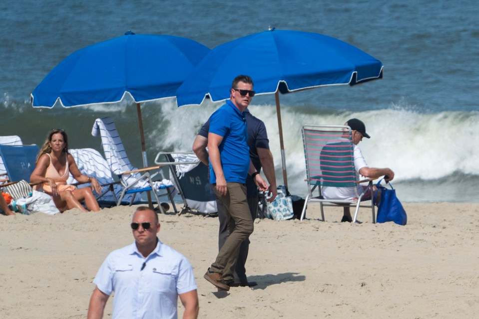 Secret Service agents guarded Biden on the beach