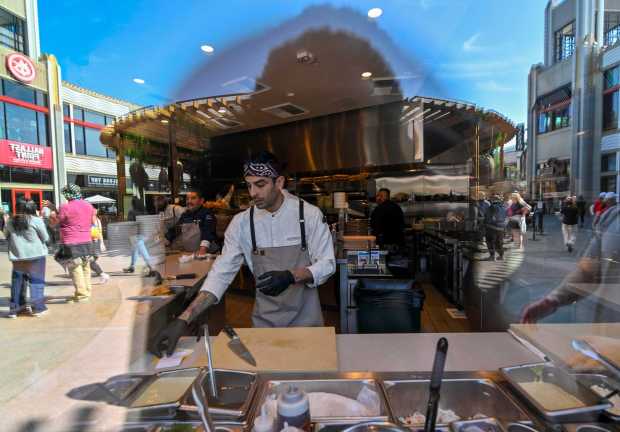 A chef makes food at Paseo, Céntrico and Tiendita in Downtown Disney during Pixar Fest in Anaheim, CA, on Wednesday, April 24, 2024. (Photo by Jeff Gritchen, Orange County Register/SCNG)