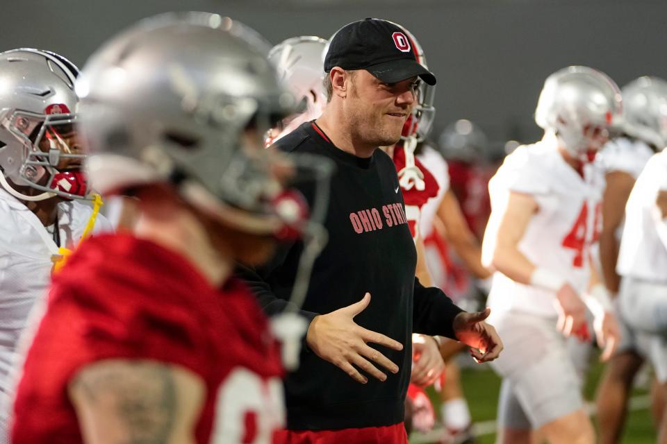 Mar 5, 2024; Columbus, OH, USA; Ohio State Buckeyes offensive line coach Justin Frye works with the team during the first spring practice at the Woody Hayes Athletic Center.