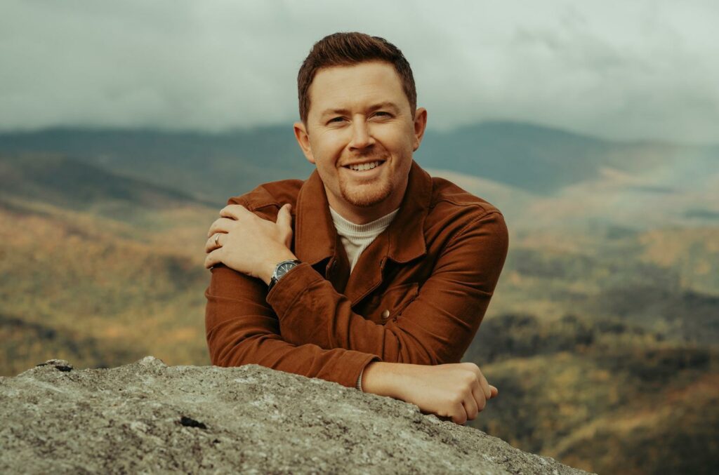 ‘Is she OK?’: Scotty McCreery stops show after seeing man hit woman in crowd – USA TODAY