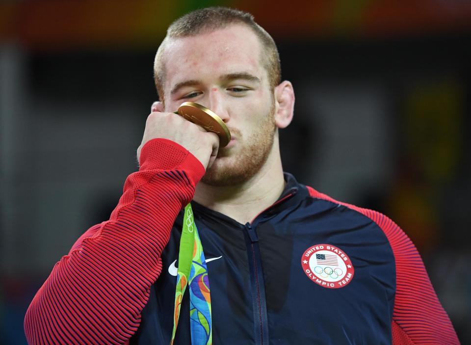 Aug 21, 2016; Rio de Janeiro, Brazil; Kyle Frederick Snyder (USA) celebrates winning the gold medal in the men's freestyle 97kg wrestling event during the Rio 2016 Summer Olympic Games at Carioca Arena 2. Mandatory Credit: Michael Madrid-USA TODAY Sports