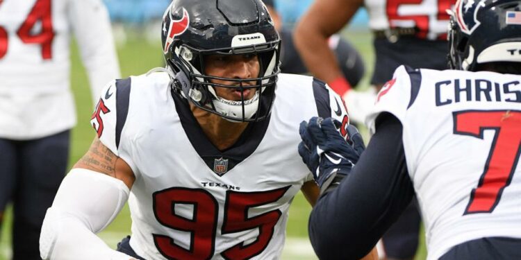 Nov 21, 2021; Nashville, Tennessee, USA; Houston Texans defensive end Derek Rivers (95) goes through drills against the Tennessee Titans during pre-game warm ups at Nissan Stadium. Mandatory Credit: Steve Roberts-USA TODAY Sports