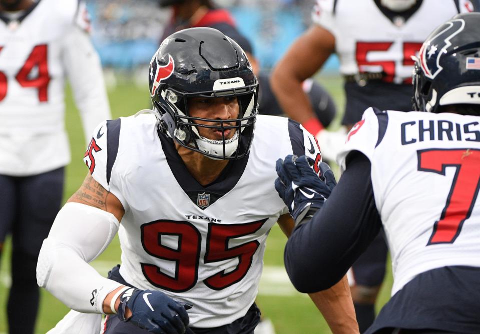 Nov 21, 2021; Nashville, Tennessee, USA; Houston Texans defensive end Derek Rivers (95) goes through drills against the Tennessee Titans during pre-game warm ups at Nissan Stadium. Mandatory Credit: Steve Roberts-USA TODAY Sports