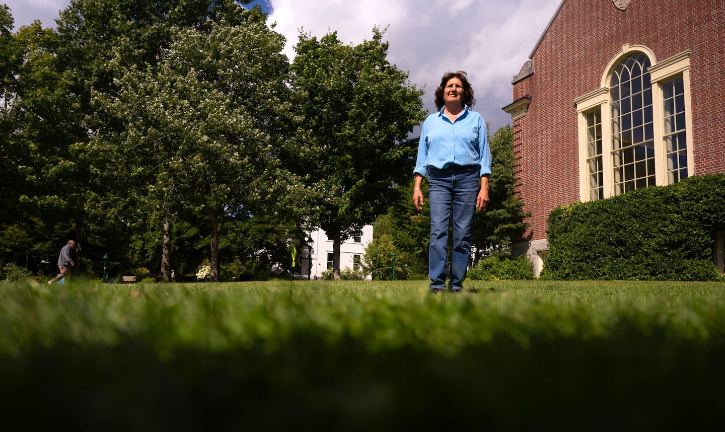 CAMDEN, MAINE - AUGUST 22, 2024 
Jo-Ann Wilson, a leader of a citizens initiative in Camden, stands for a portrait on the lawn of Camden Public Library on Main Street in Camden, Maine on Thursday, August 22, 2024.