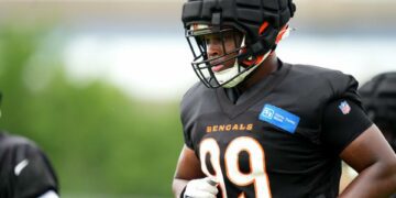 Jul 28, 2023; Cincinnati, Ohio, USA; Cincinnati Bengals defensive end Myles Murphy (99) jogs between drills during training camp at the practice fields next to Paycor Stadium. Mandatory Credit: Kareem Elgazzar/The Cincinnati Enquirer-USA TODAY Sports