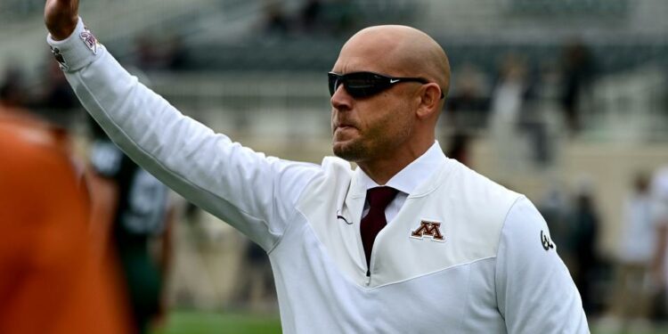 Sep 24, 2022; East Lansing, Michigan, USA; Minnesota Golden Gophers head coach PJ Fleck waves to fans at Spartan Stadium before playing MSU. Mandatory Credit: Dale Young-USA TODAY Sports