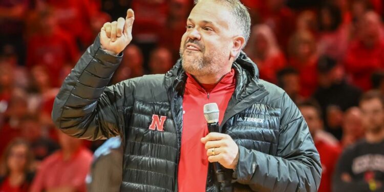 Dec 10, 2022; Lincoln, Nebraska, USA; Nebraska Cornhuskers head football coach Matt Rhule talks to the crowd during halftime of the game against the Purdue Boilermakers in the first half at Pinnacle Bank Arena. Mandatory Credit: Steven Branscombe-USA TODAY Sports