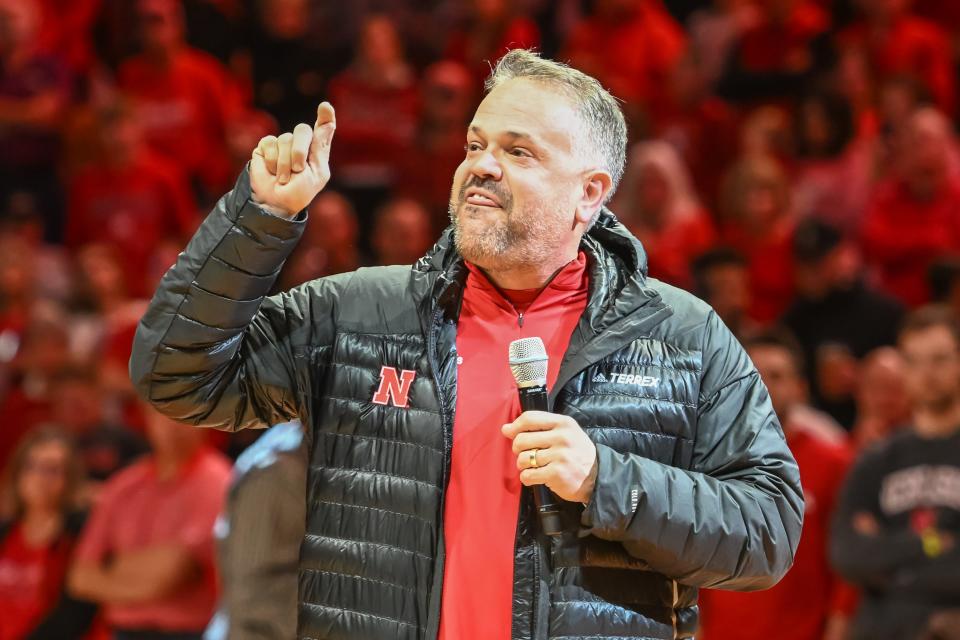 Dec 10, 2022; Lincoln, Nebraska, USA; Nebraska Cornhuskers head football coach Matt Rhule talks to the crowd during halftime of the game against the Purdue Boilermakers in the first half at Pinnacle Bank Arena. Mandatory Credit: Steven Branscombe-USA TODAY Sports