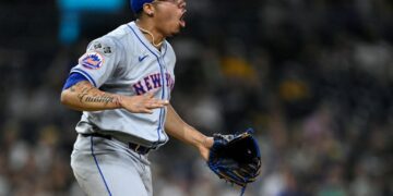 New York Mets relief pitcher Dedniel Nunez (72) celebrates on the field after defeating the San Diego Padres at Petco Park.