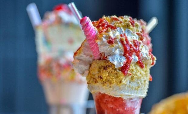 Black Tap Craft Burgers & Beer - Strawberry Shortcake Shake, vanilla frosted rim with crumbled cake topped with a strawberry shortcake ice cream bar, pink and white twisty pop, whipped cream strawberry drizzle, crumbled cake and a cherry at Downtown Disney District in Anaheim, CA, on Thursday, May 2, 2019. (Photo by Jeff Gritchen, Orange County Register/SCNG)