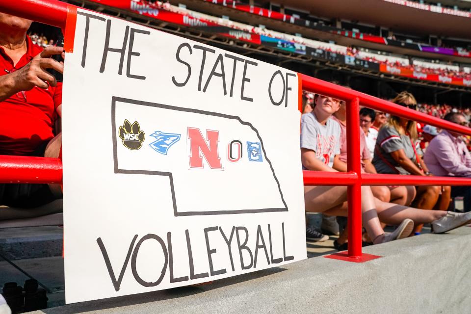 Aug 30, 2023; Lincoln, NE, USA; A volleyball sign hangs in the stands before the game between the Nebraska Cornhuskers and the Omaha Mavericks at Memorial Stadium. Mandatory Credit: Dylan Widger-USA TODAY Sports