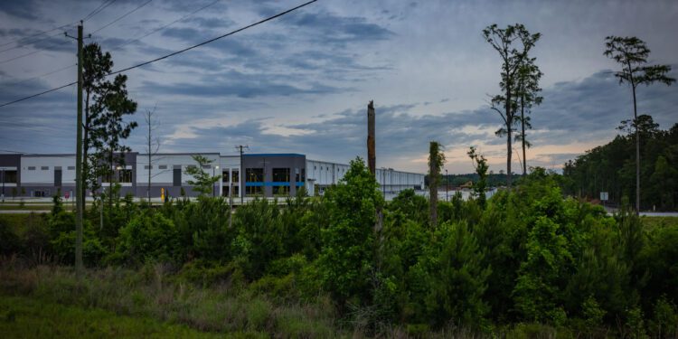 A warehouse is pictured.