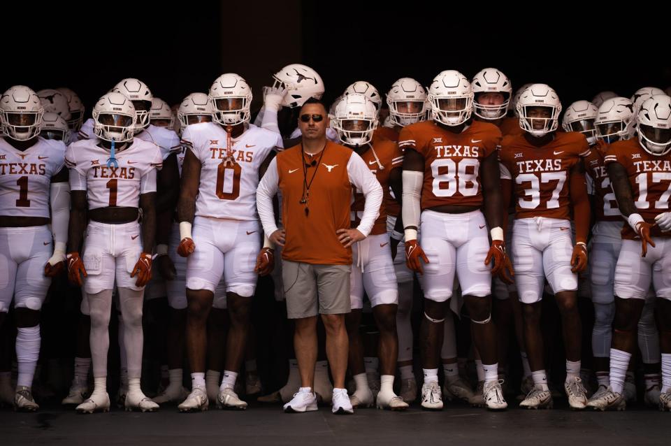 The Texas teams, with Head Coach Steve Steve Sarkisian, line up to run out of the tunnel ahead of the Longhorn's Orange and White spring football game in Darrell K Royal-Texas Memorial Stadium, Saturday, April 15, 2023.