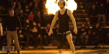 Iowa's Spencer Lee is introduced before wrestling OSU's Nick Piccininni at 125 pounds during the Hawkeyes regular season meet against Oklahoma State at Carver-Hawkeye Arena on Iowa City on Sunday, January 14, 2018. Lee won the match 10-5. (Ben Roberts/Freelance)