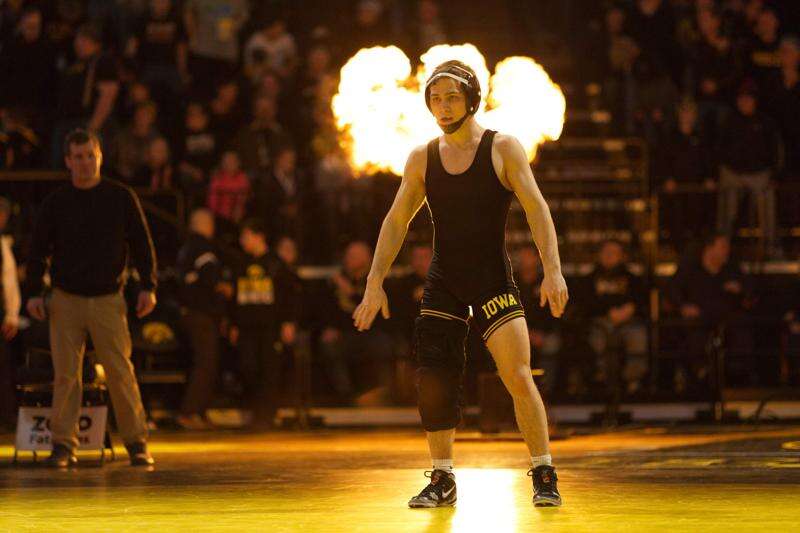 Iowa's Spencer Lee is introduced before wrestling OSU's Nick Piccininni at 125 pounds during the Hawkeyes regular season meet against Oklahoma State at Carver-Hawkeye Arena on Iowa City on Sunday, January 14, 2018. Lee won the match 10-5. (Ben Roberts/Freelance)