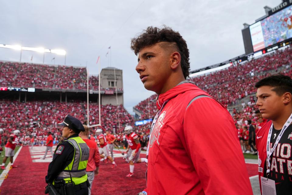 Sept. 3, 2022; Columbus, Ohio; Quarterback recruit Dylan Raiola walks the sideline prior to the NCAA football game between the Ohio State Buckeyes and Notre Dame Fighting Irish at Ohio Stadium. Adam Cairns-USA TODAY Sports