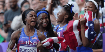 Sha'carri Richardson (USA) celebrates with Melissa Jefferson (USA), Twanisha Terry (USA) and Gabrielle Thomas (USA)