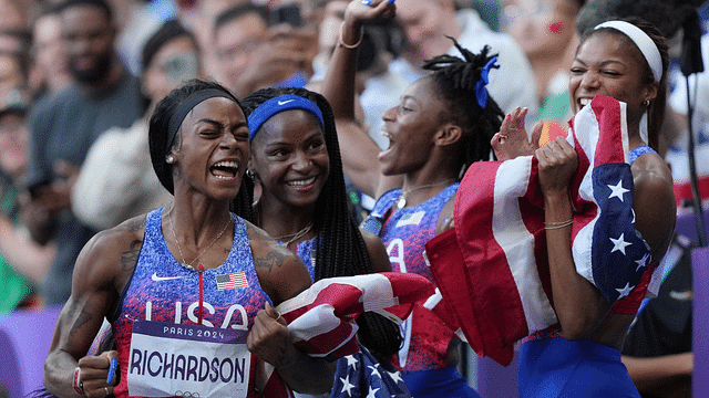 Sha'carri Richardson (USA) celebrates with Melissa Jefferson (USA), Twanisha Terry (USA) and Gabrielle Thomas (USA)