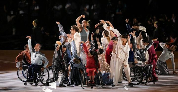 French singer Lucky Love (center) performs during the Paris 2024 Paralympic Games Opening Ceremony at the Place de la Concorde in Paris on Aug. 28, 2024.