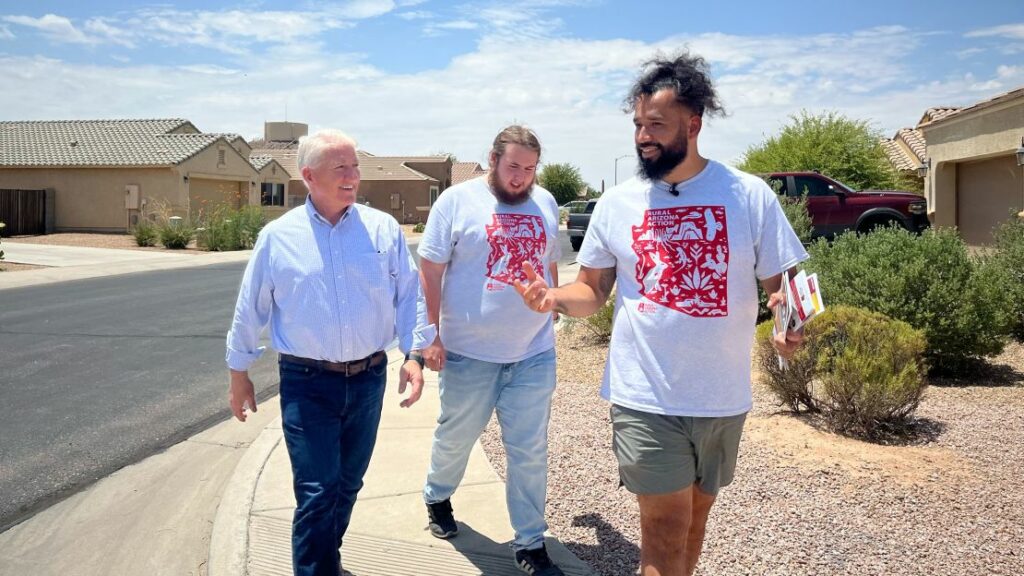 John King walks with Rural Arizona Action members in Pinal County, Arizona.