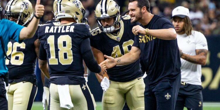 Aug 25, 2024; New Orleans, Louisiana, USA; New Orleans Sainte quarterback Derek Carr (4) and fullback Adam Prentice (46) congratulate quarterback Spencer Rattler (18) after passing a touchdown against the Tennessee Titans during the first half at Caesars Superdome. Mandatory Credit: Stephen Lew-USA TODAY Sports