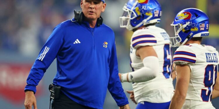 Dec 26, 2023; Phoenix, AZ, USA; Kansas Jayhawks head coach Lance Leipold looks on during the first quarter against the UNLV Rebels in the Guaranteed Rate Bowl at Chase Field. Mandatory Credit: Mark J. Rebilas-USA TODAY Sports ORG XMIT: IMAGN-715777 ORIG FILE ID: 20231226_pjc_su5_815.JPG