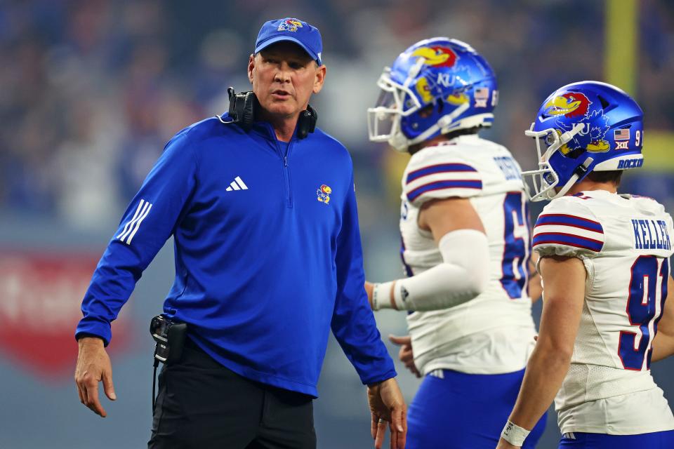 Dec 26, 2023; Phoenix, AZ, USA; Kansas Jayhawks head coach Lance Leipold looks on during the first quarter against the UNLV Rebels in the Guaranteed Rate Bowl at Chase Field. Mandatory Credit: Mark J. Rebilas-USA TODAY Sports ORG XMIT: IMAGN-715777 ORIG FILE ID: 20231226_pjc_su5_815.JPG