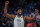 PARIS, FRANCE - AUGUST 8: Joel Embiid #11 of United States celebrates their victory during a Men's basketball semifinals match between Team United States and Team Serbia on day thirteen of the Olympic Games Paris 2024 at Bercy Arena on August 08, 2024 in Paris, France. (Photo by RvS.Media/Monika Majer/Getty Images)