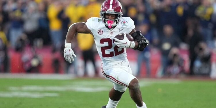 Jan 1, 2024; Pasadena, CA, USA; Alabama Crimson Tide running back Justice Haynes (22) runs the ball against the Michigan Wolverines during the second half in the 2024 Rose Bowl college football playoff semifinal game at Rose Bowl. Mandatory Credit: Kirby Lee-USA TODAY Sports