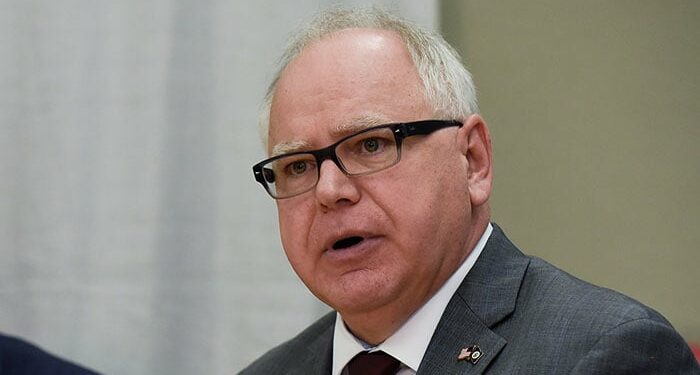 Minnesota Governor Tim Walz speaks during a political gathering. — Reuters/File