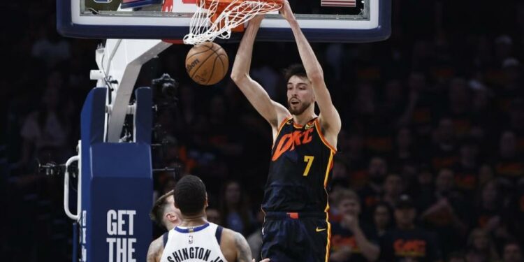 May 15, 2024; Oklahoma City, Oklahoma, USA; Oklahoma City Thunder forward Chet Holmgren (7) dunks against the Dallas Mavericks during the second half of game five of the second round for the 2024 NBA playoffs at Paycom Center. Mandatory Credit: Alonzo Adams-USA TODAY Sports