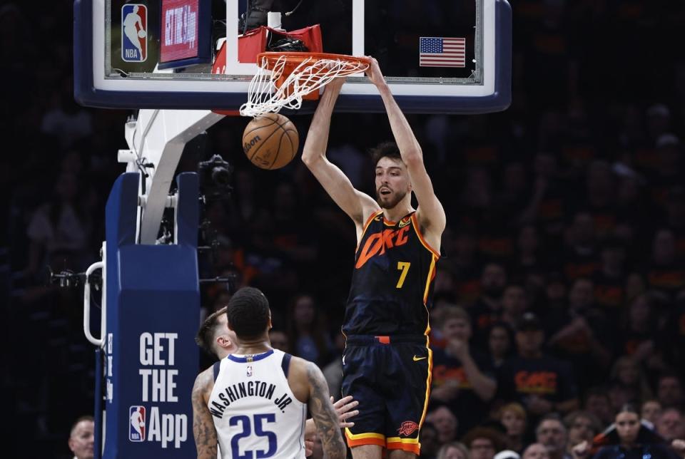 May 15, 2024; Oklahoma City, Oklahoma, USA; Oklahoma City Thunder forward Chet Holmgren (7) dunks against the Dallas Mavericks during the second half of game five of the second round for the 2024 NBA playoffs at Paycom Center. Mandatory Credit: Alonzo Adams-USA TODAY Sports