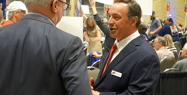 Navy veteran Joe Fraser, right, won 29.3% of the vote and five other Republican candidates divided up the rest.