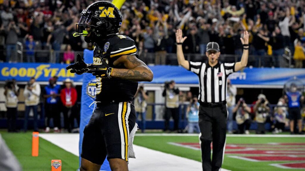 Missouri Tigers wide receiver Luther Burden III (3) celebrates after he catches a pass for a touchdown against the Ohio State Buckeyes during the fourth quarter at AT&T Stadium.