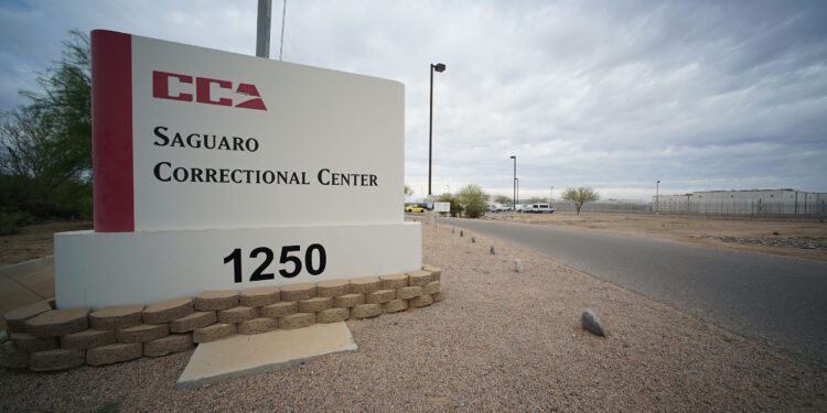 Saguaro Correctional Center Eloy Arizona sign, entrance into parking lot.