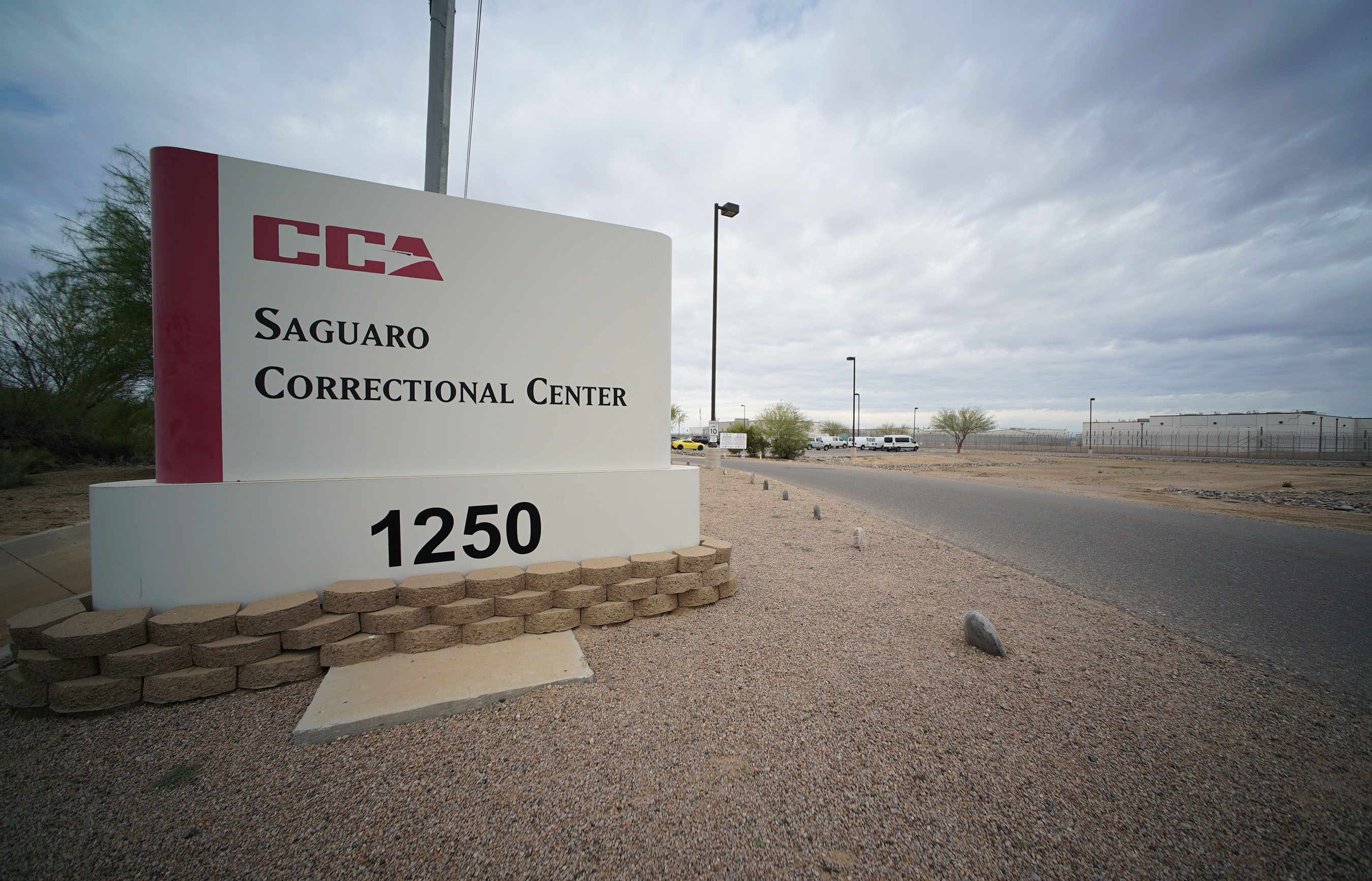 Saguaro Correctional Center Eloy Arizona sign, entrance into parking lot.