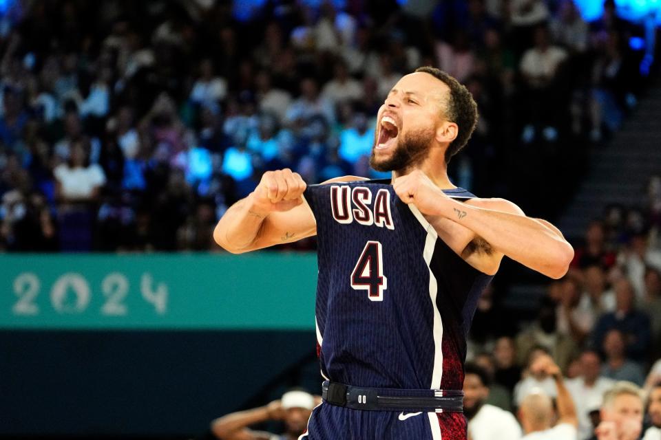 Aug 10, 2024; Paris, France; United States shooting guard Stephen Curry (4) celebrates in the second half against France in the men's basketball gold medal game during the Paris 2024 Olympic Summer Games at Accor Arena. Mandatory Credit: Rob Schumacher-USA TODAY Sports ORG XMIT: OLY-890027 ORIG FILE ID: 20240810_lbm_usa_222.JPG