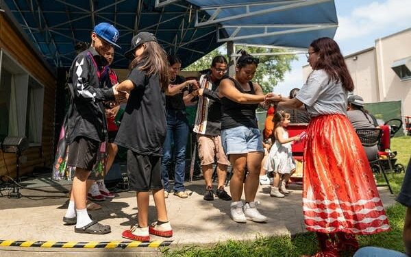 People dance on a stage